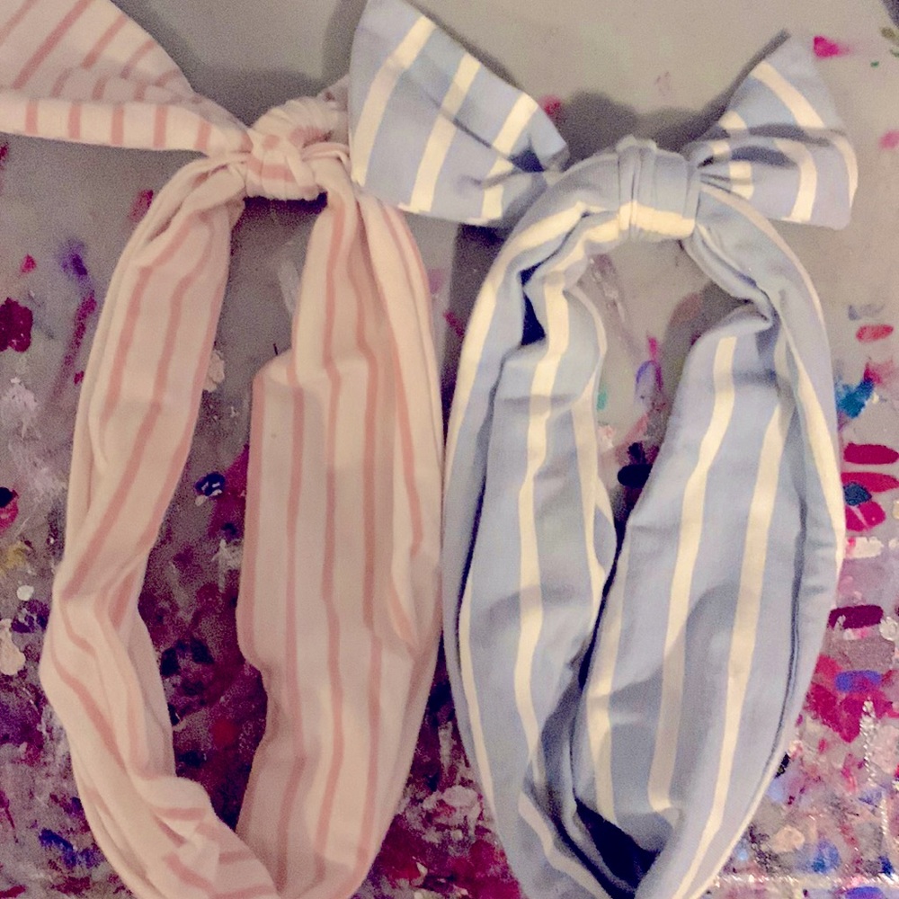 Two striped, like-new headbands, one size fits most.